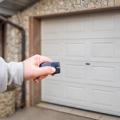 Detroit security key fob pointing to a garage door